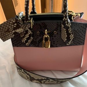 City steamer handbag Louis Vuitton Pink in Water snake - 26287346